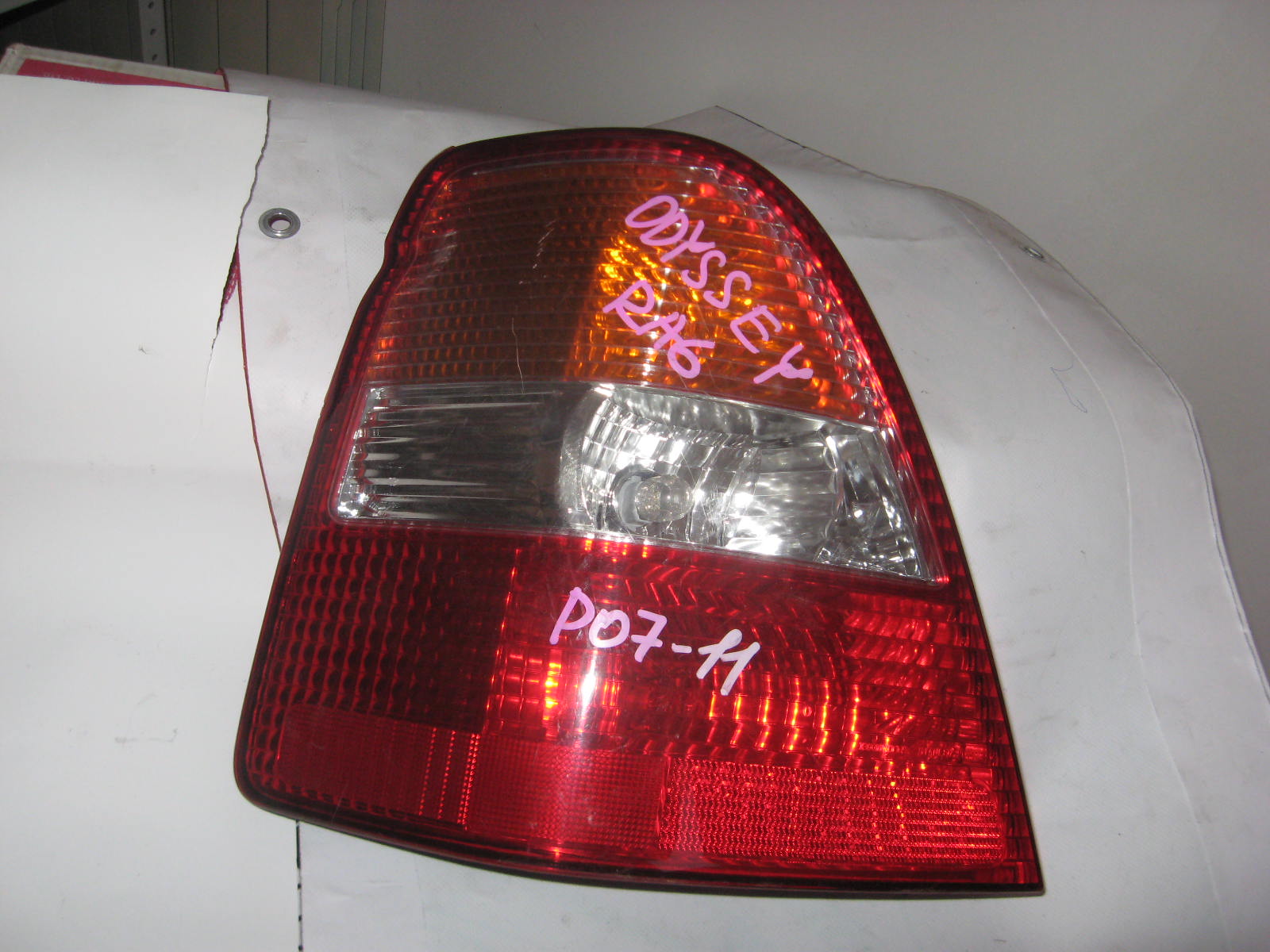 Задний фонарь HON ODYSSEY (RA6)  P07-11 L  [б/у] на ФОНАРЬ HONDA