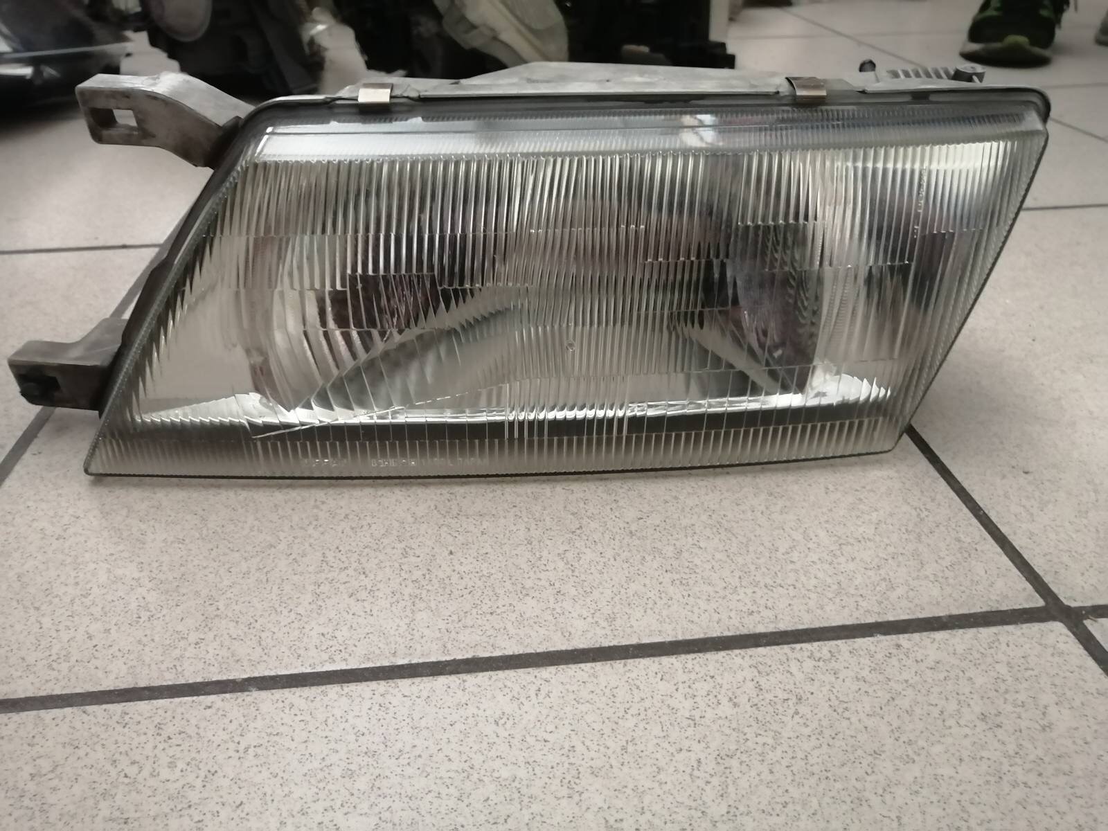 Фара NIS SUNNY B14 14-98 L [б/у] на NISSAN SUNNY